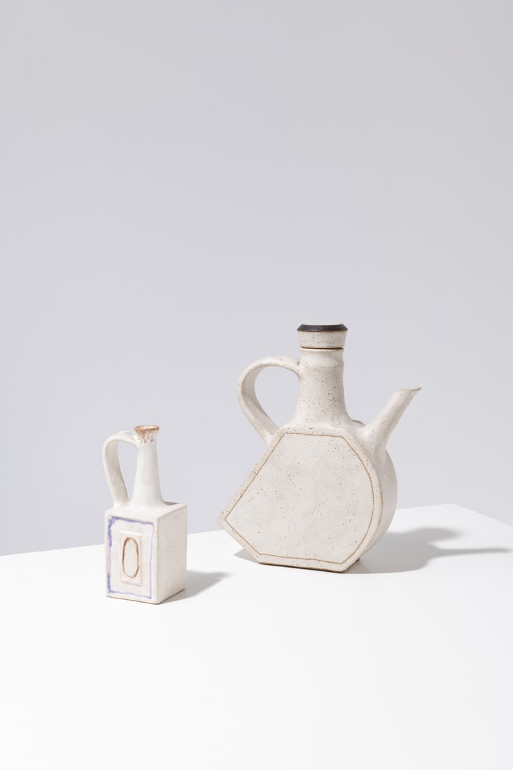 Bruno Gambone (1936–2021) Set of two jugs: Bruno Gambone (1936–2021)Set of two jugsGlazed stonewareSigned ‘Gambone Italy’Models created around 1970H 19.5 × W 6.5 × D 6.5 cmH 28.5 × W 20 × D 7 cm