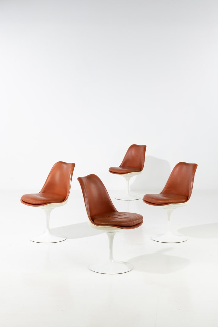 Eero Saarinen (1910-1961) Set of four chairs - ‘Tulip’ model Fiberglass, aluminum, and: Eero Saarinen (1910-1961)Set of four chairs - ‘Tulip’ modelFiberglass, aluminum, and leatherKnoll editionDesigned in 1956H 82 × W 52 × D 52 cm