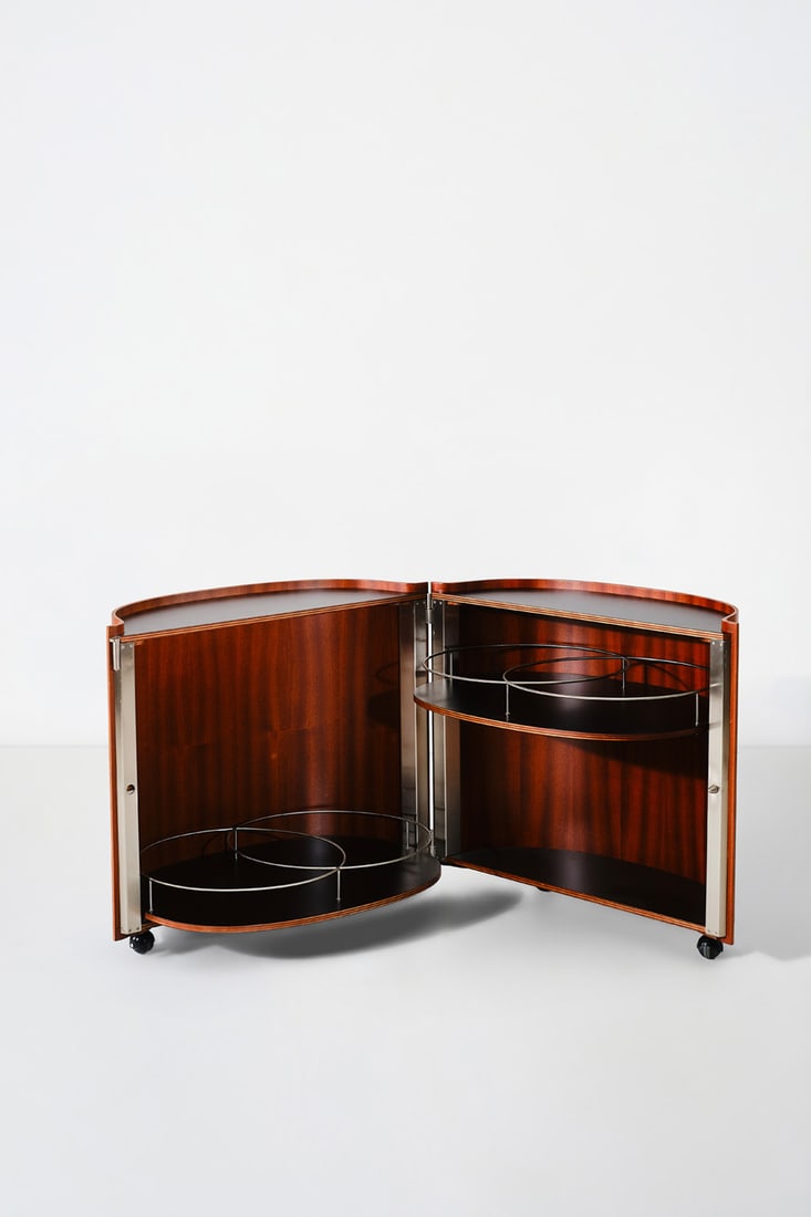 Eugenio Gerli (1923-2013) Drinks trolley - Model B106, 'Jamaica': Eugenio Gerli (1923-2013)Drinks trolley - Model B106, 'Jamaica'Veneered plywood, lacquered wood and steelEdited by TecnoModel created in 1966H 73×L 89×W 54cmBibliography:- G. Bosoni, "Osvaldo Borsan