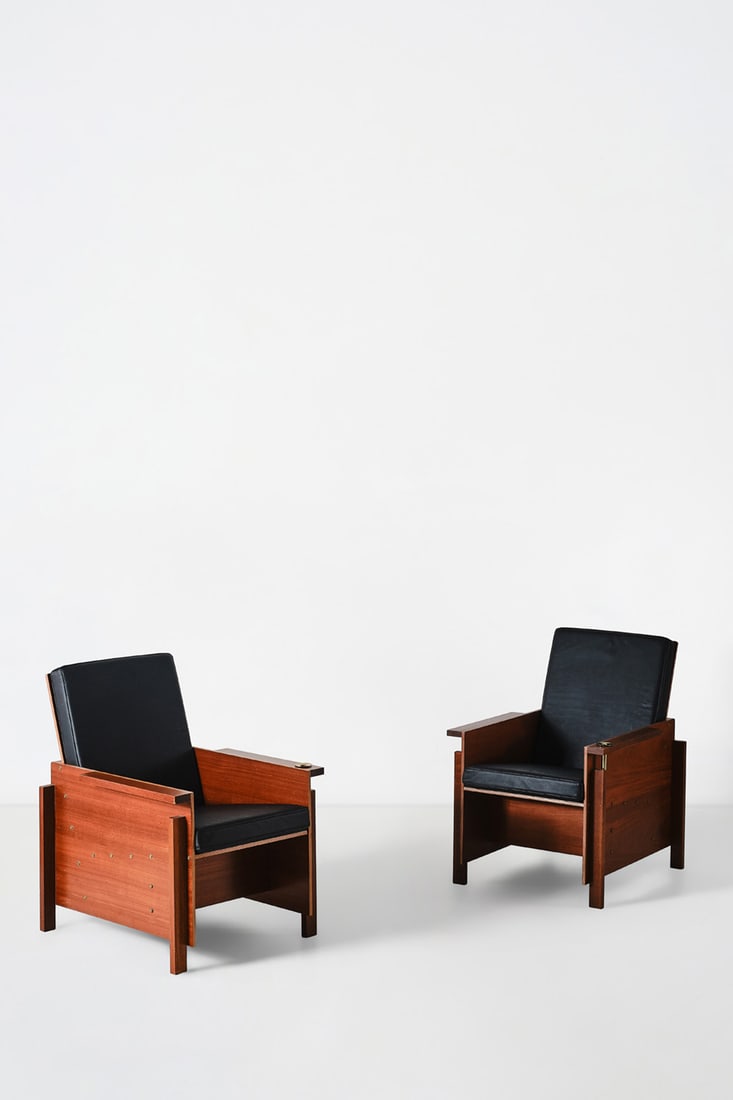 Man Ray (1890-1976), after Pair of armchairs: Man Ray (1890-1976), afterPair of armchairsPlywood, brass and leatherEdited by TecnoManufacturer’s labelModel created in 1930Production date: circa 1991H 90×L 65×W 78cmA certificate fr