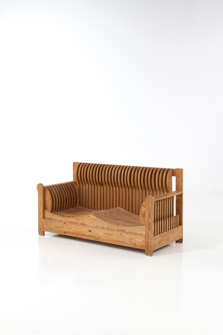 Mario Ceroli (born 1938) 'Acqua e Terra' sofa 'Mobili nella Valle' series: Mario Ceroli (born 1938)'Acqua e Terra' sofa'Mobili nella Valle' seriesPine woodEdited by PoltronovaInscribed with 'Ceroli /Poltronova'Model created circa 1970H 81 ×L 152×W 63cm