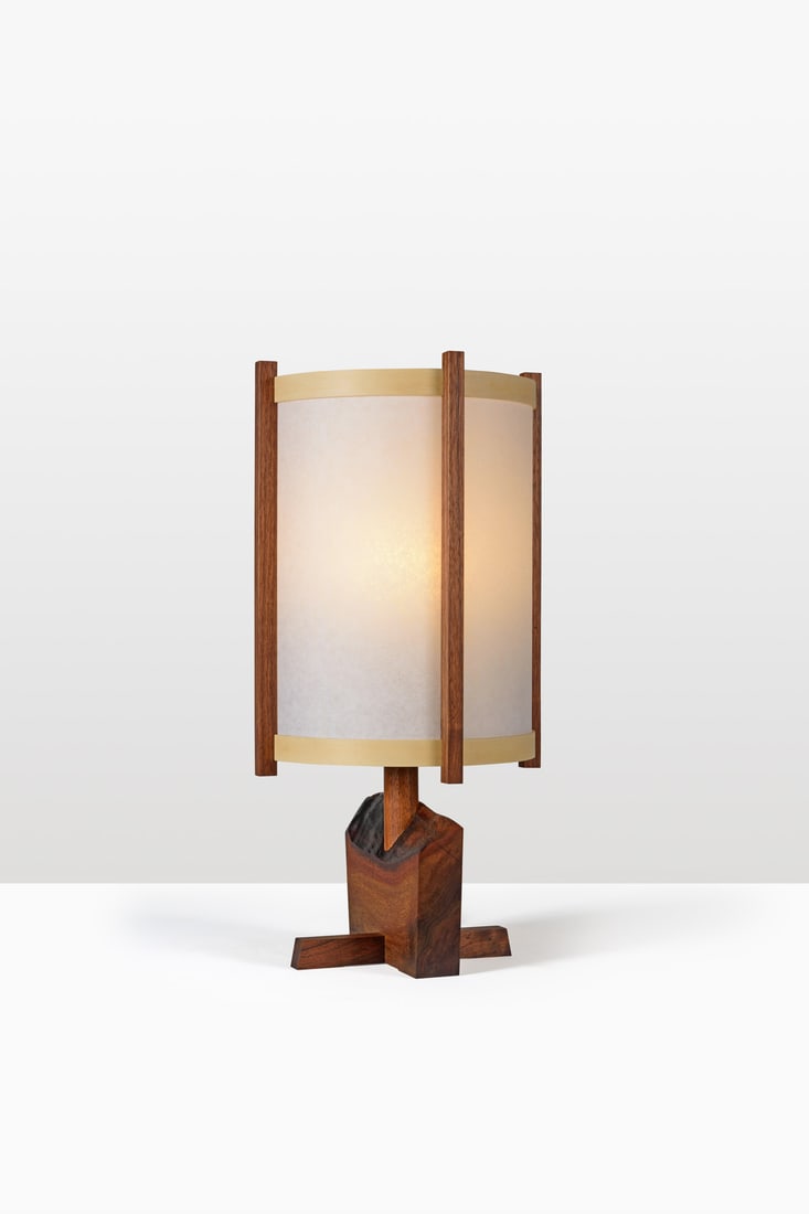George Nakashima (1905-1990) Table lamp: George Nakashima (1905-1990)Table lampWalnut, wood and washi paperEdited by Sakura, JapanHot stamped 'Nakashima'Model created circa 2010H 53cm