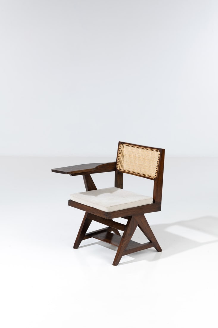 Pierre Jeanneret (1896-1967) Tablet chair - Model PJ-SI-26-A: Pierre Jeanneret (1896-1967)Tablet chair - Model PJ-SI-26-ATeak and caningInscribed with I.A.SModel created circa 1960H 79×L 54×W 62cmProvenance: Administrative buildings and Penjab universi