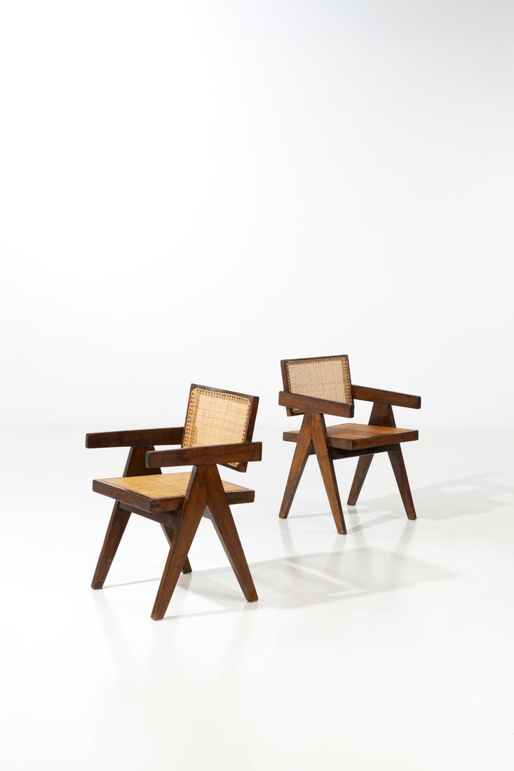 Pierre Jeanneret (1896-1967) Pair of 'Office chairs': Pierre Jeanneret (1896-1967)Pair of 'Office chairs'Teak and caningModel created circa 1955H 78,5×L 50×W 50cmProvenance: Administrative buildings,Chandigarh, India.Bibliography: L. & P.Seguin