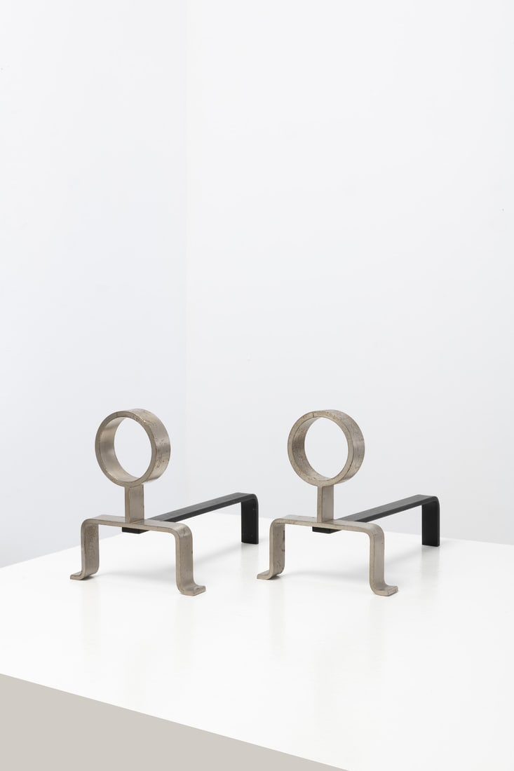 Melchiorre Bega (1898-1976) Pair of andirons: Melchiorre Bega (1898-1976)Pair of andironsCast iron and steelModel created in the 1960sH 25×L 35×W 21 cm