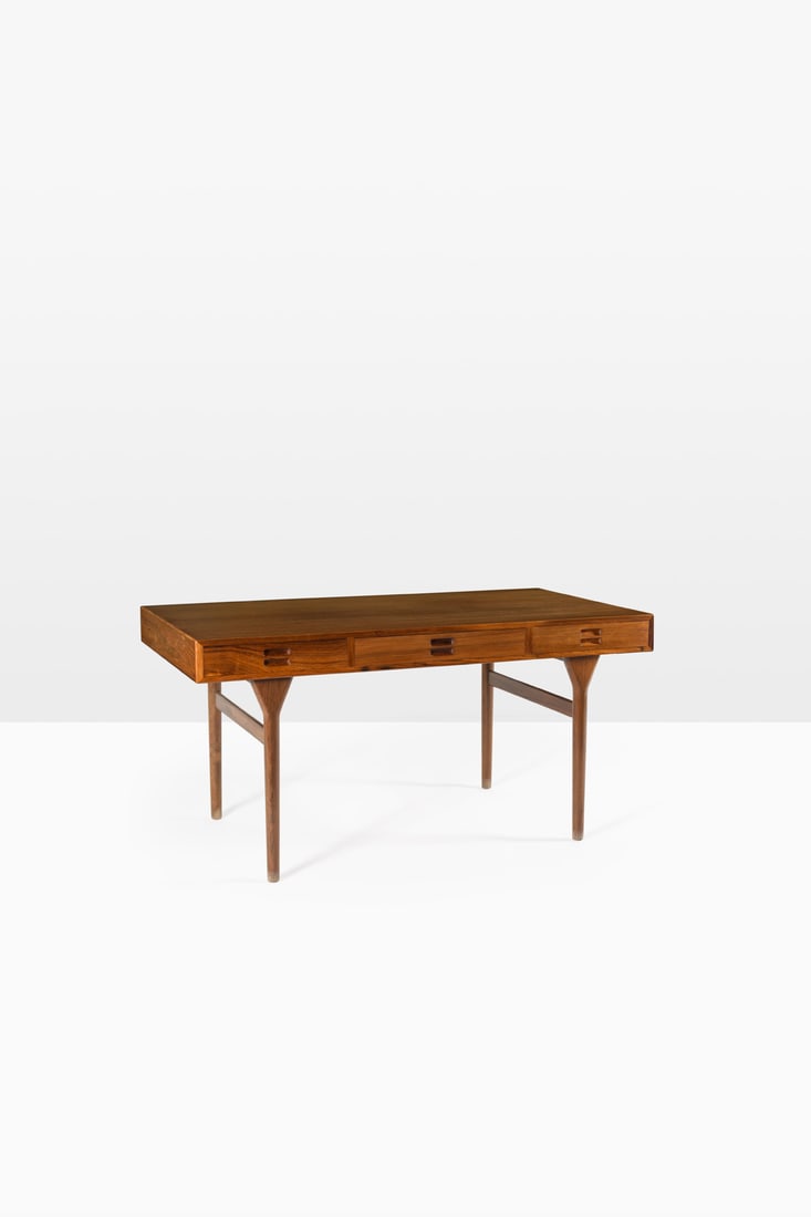 Nanna Ditzel (1923-2005) Desk: Nanna Ditzel (1923-2005)DeskWood and veneerEdited by Søren WilladsenModel created circa 1955H 72×L 175×W 75cmBibliography: Design Museum Danmark,Furniture index, model referenced under