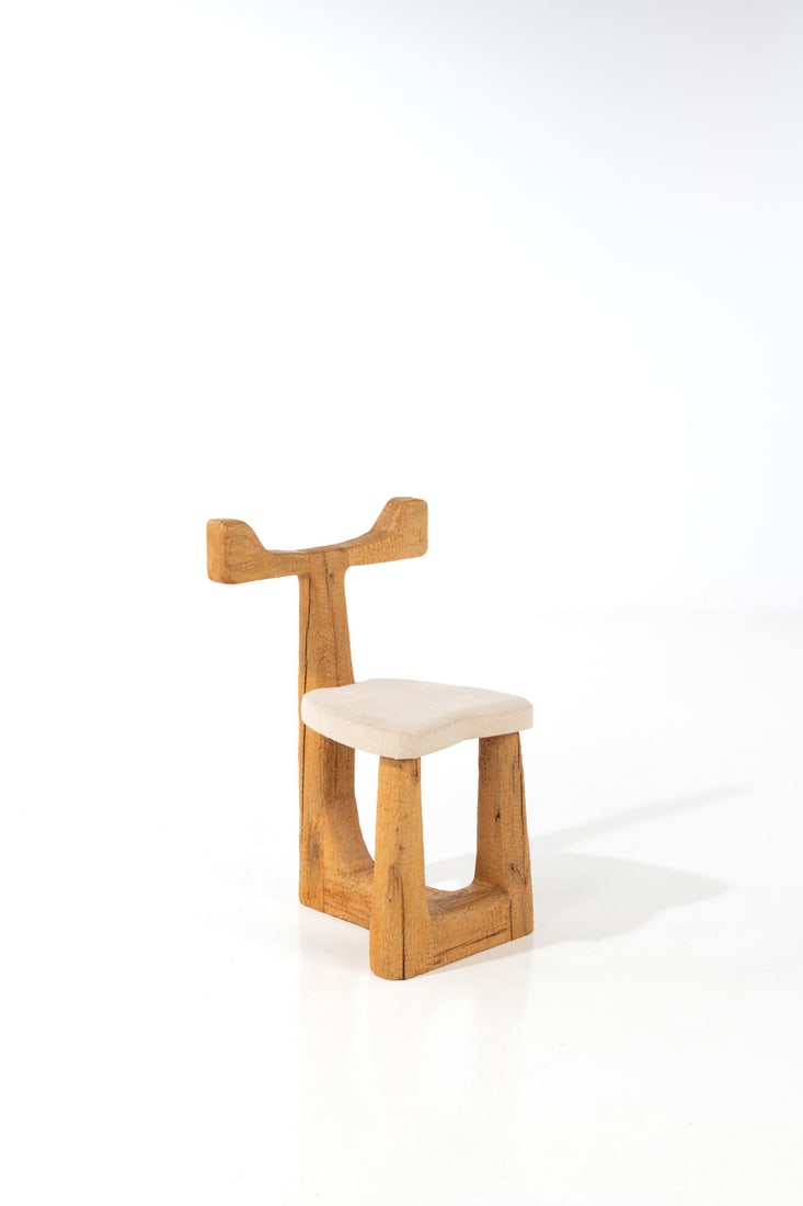 Pavel Novak (XX) Sculptural chair: Pavel Novak (XX)Sculptural chairGouged oak and fabricCreation date: circa 1980H 89 X L 58 X P 46 cm