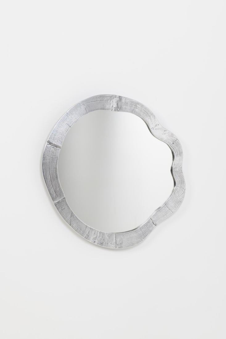 xx Andrea Salvetti (1967-2017) Mirror - 'Tronchi' model: xx Andrea Salvetti (1967-2017)Mirror - 'Tronchi' modelCast aluminum and mirrorEdited by Galerie Avant-ScèneIncised signature 'Andrea Salvetti' on the frameModel created in 2011H 72 × L 71 &#