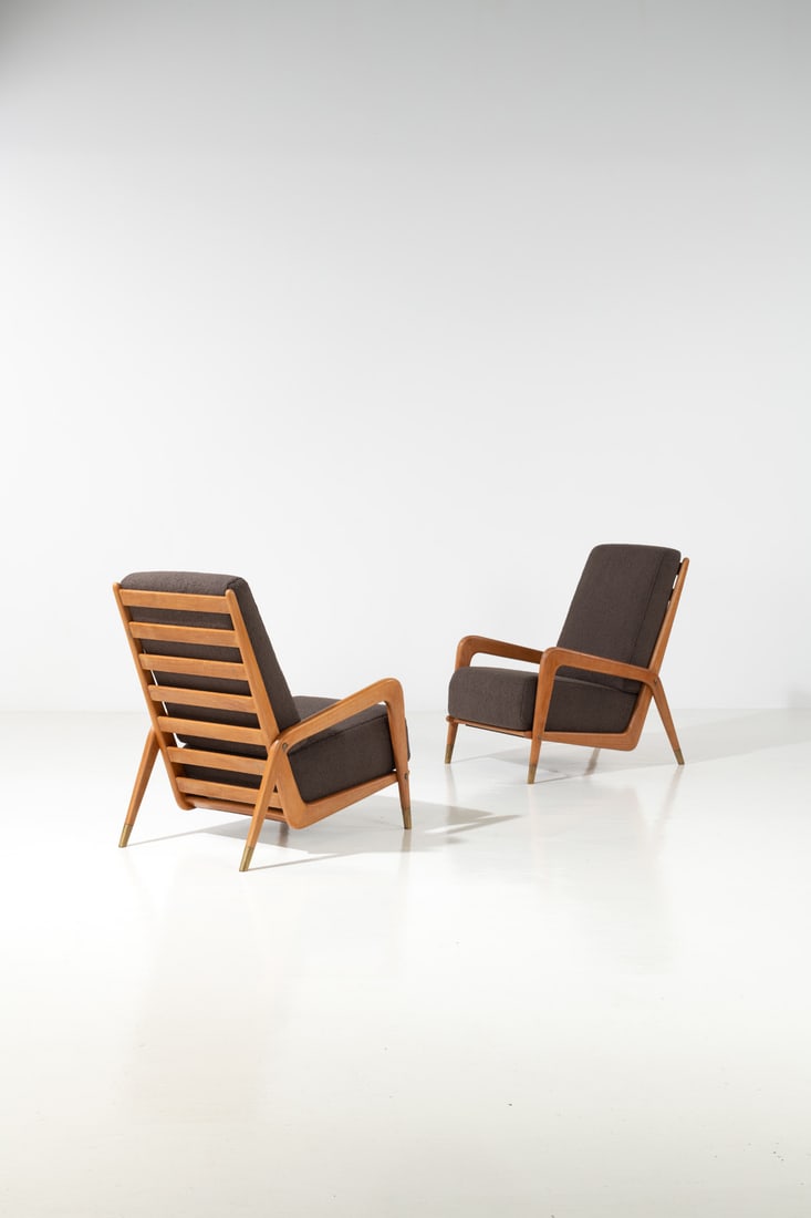 Gio Ponti (1891-1979) Pair of armchairs: Gio Ponti (1891-1979)Pair of armchairsWalnut, brass and fabricEdited by Casa e GiardinoModel created in the 1930sH 86 × L 60 × W 85 cmExpertise conducted by the Gio Ponti Archives.