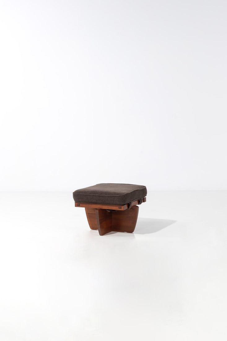xx George Nakashima (1905-1990) Stool or hassock - 'Greenrock' Model: xx George Nakashima (1905-1990)Stool or hassock - 'Greenrock' ModelSpecial orderWalnut and fabricSigned 'George Nakashima' and dated 'May 201989' beneath a crossbeamModel created in 1988H 38,5 ×
