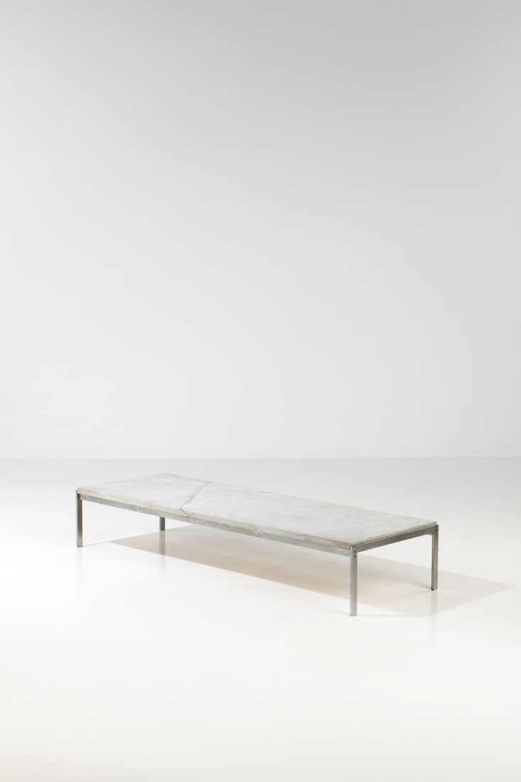 Poul Kjaerholm (1929-1980) Coffee table - Model 'PK 63A': Poul Kjaerholm (1929-1980)Coffee table - Model 'PK 63A'Steel and marbleEdited by E. Kold ChristensenManufacturer’s stamp on a crossbeamModel created in 1968, this model is a first