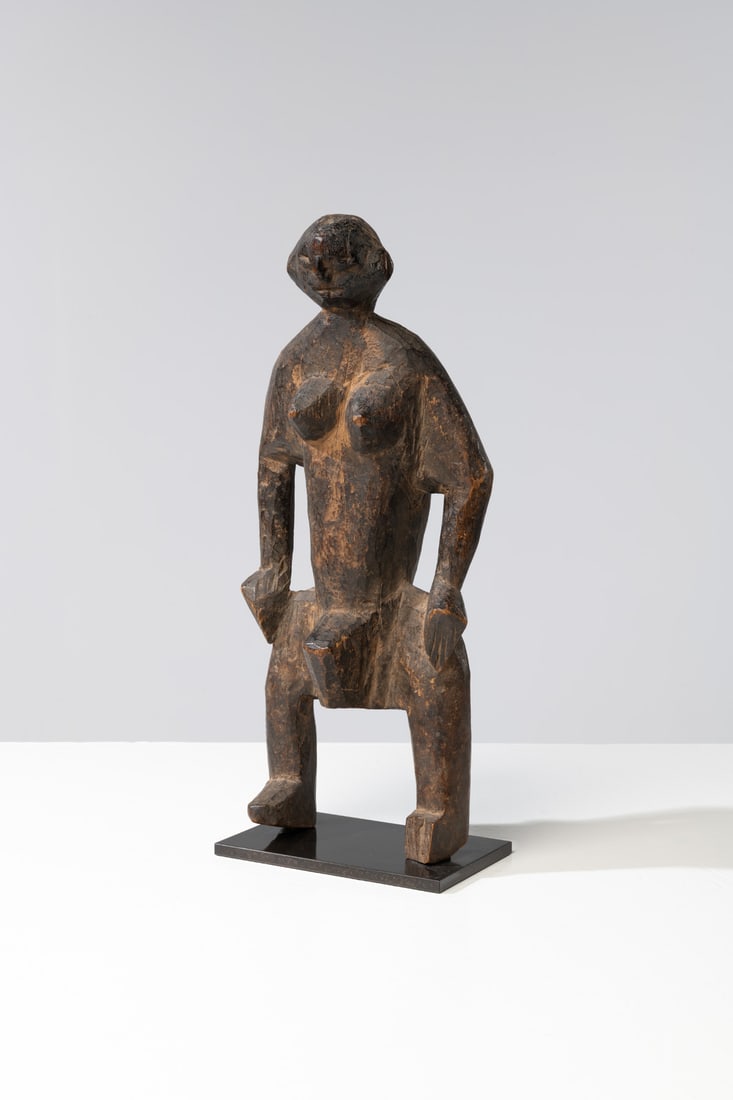 Mossi Statue (Burkina Faso) Wood: Mossi Statue (Burkina Faso)Wood20th c.9H 43×L 18×W 11 cmProvenance:- Former Jeremiah Fogelson collection, Oregon,USA- Pace Gallery, NYC, USA