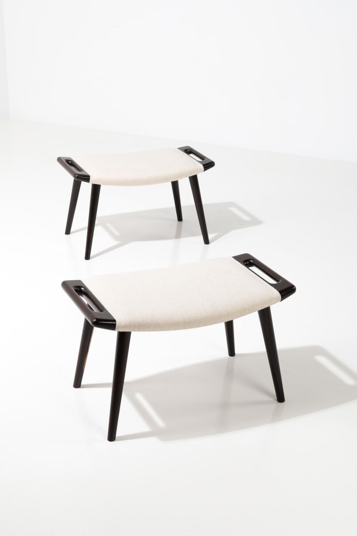 Hans J. Wegner (1914-2007) Pair of hassocks: Hans J. Wegner (1914-2007)Pair of hassocksModel AP29, 'Papa Bear'Rosewood and fabricModel created in 1960H 40×L 69,5×W 40cmBibliography: N. Oda, 'Hans J. Wegner's 100Chairs', Corona Books,