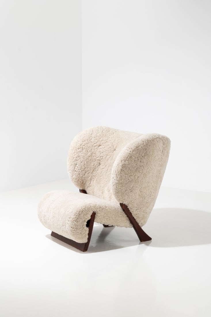Viggo Boesen (1907-1985) Armchair: Viggo Boesen (1907-1985)ArmchairStained oak and sheepskinModel created in 1940H 97× L 92 × W 95 cm