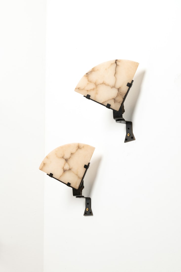 Pierre Chareau (1883-1950) Pair of sconces, model LA 164: Pierre Chareau (1883-1950)Pair of sconces, model LA 164Patinated metal and alabasterModel created circa 1923H 23,5 × L 23 × W 12 cmBibliography: - 'Pierre Chareau architecte-meublier,