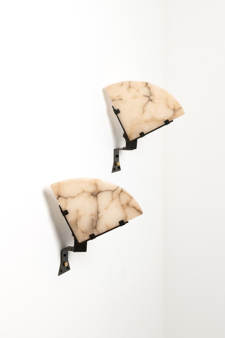 Pierre Chareau (1883-1950) Pair of sconces, model LA 164: Pierre Chareau (1883-1950)Pair of sconces, model LA 164Patinated metal and alabasterModel created circa 1923H 23,5 × L 23 × W 12 cmBibliography: - 'Pierre Chareau architecte-meublier,