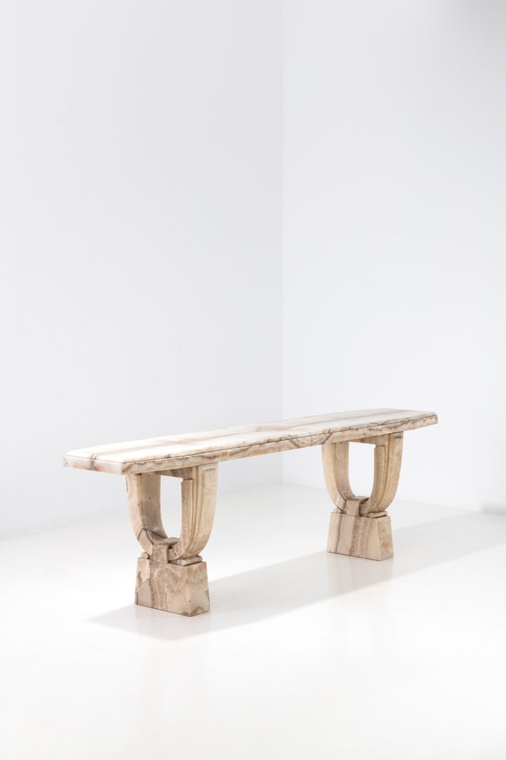 x Félix Davin (1902-1976) Console - Special order: x Félix Davin (1902-1976)Console - Special orderMarble-onyxModel created circa 1939H 84 × L 271 × W 52 cmProvenance: Created for a Parisian apartment featured in Plaisir de France