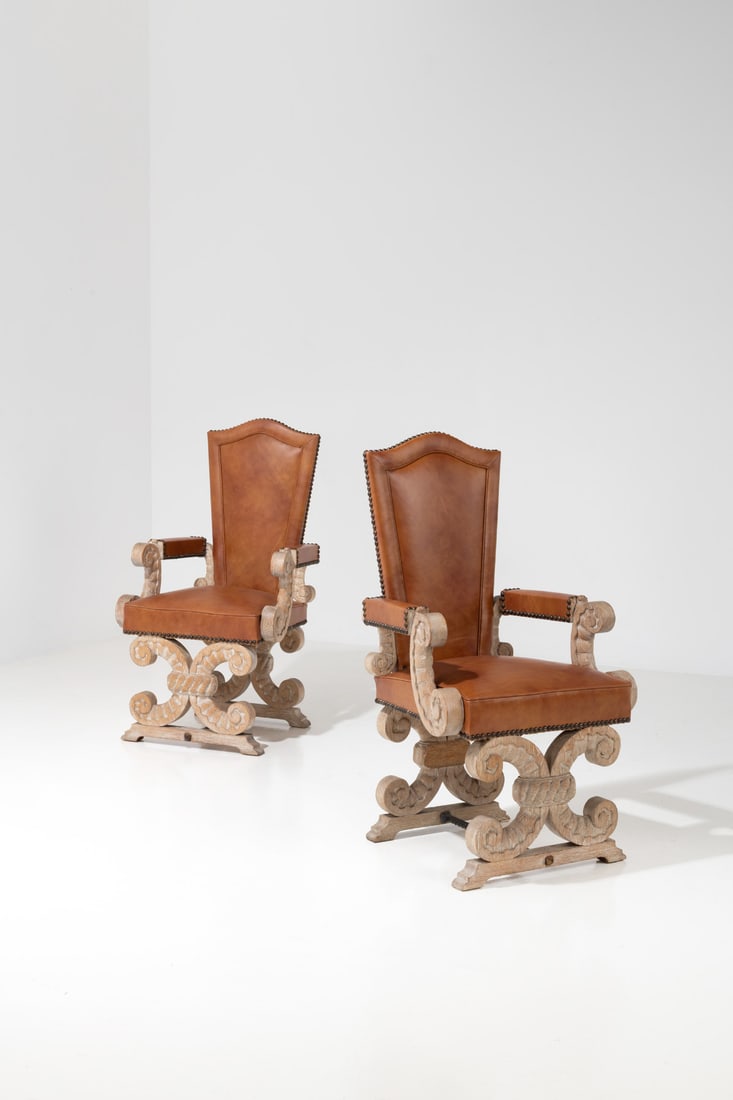 x Jean-Charles Moreux (1889-1956), attributed to Pair of armchairs: x Jean-Charles Moreux (1889-1956), attributed toPair of armchairsOak, metal and leatherModel created circa 1940H 107 × L 57 × W 52 cm