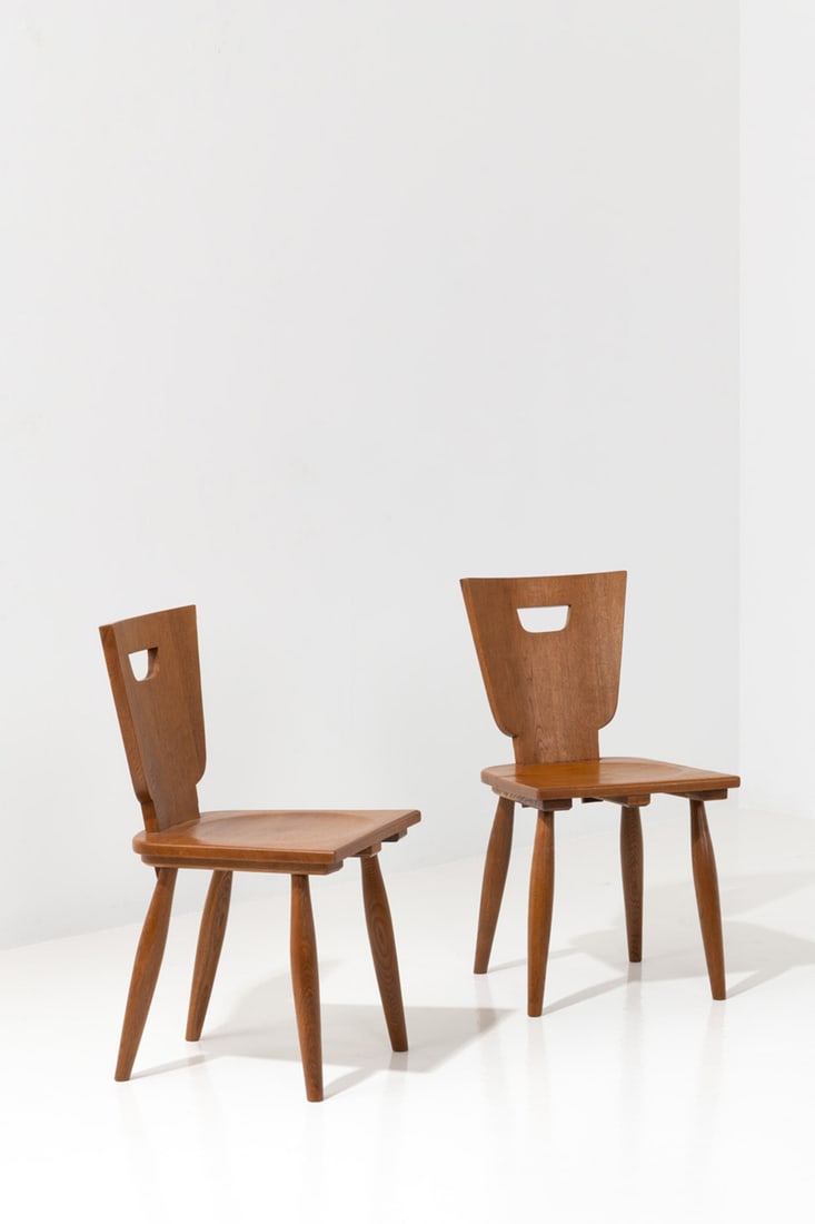 xx Jean Royère (1902-1981) Pair of 'Rustique' chairs (1 of 2)