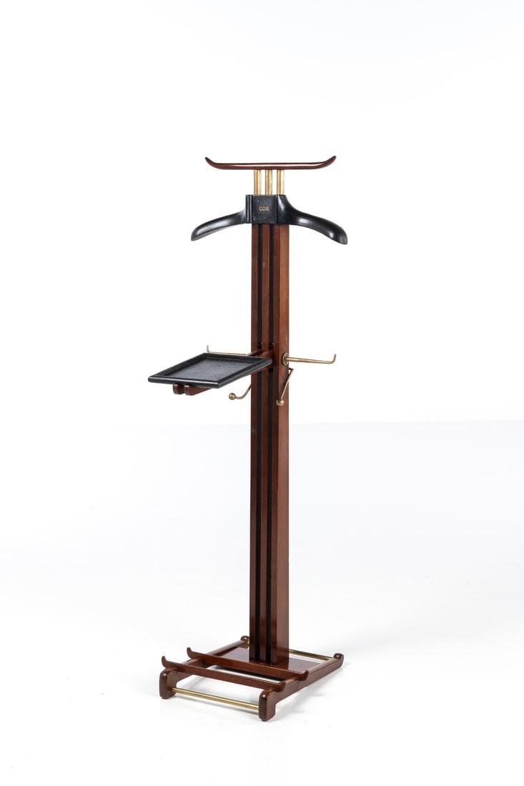 Paul Dupré-Lafon (1900-1971) Valet: Paul Dupré-Lafon (1900-1971)ValetOak, leather and brassGilded monogram 'C.O.S.' on the hangerModel created circa 1940H 135 × L 45 × W 43,5 cmBibliography: - 'Paul Dupré-Lafon d