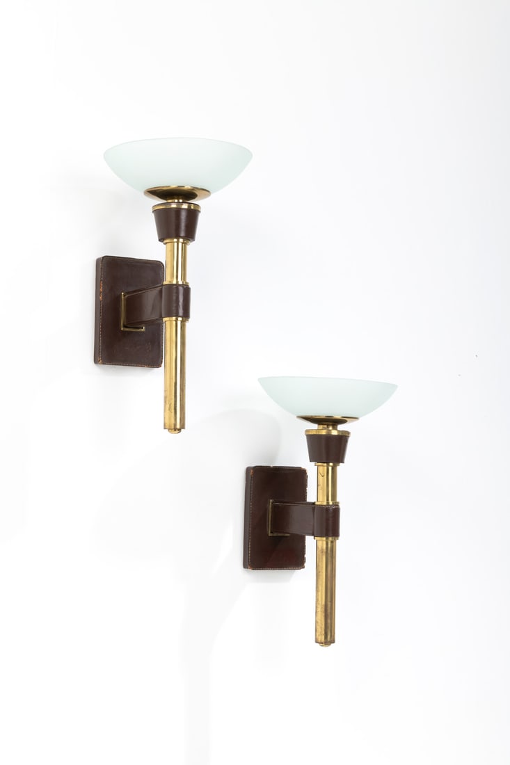 xx Jacques Adnet (1918-1992) Pair of 'Flambeaux' sconces (1 of 1)