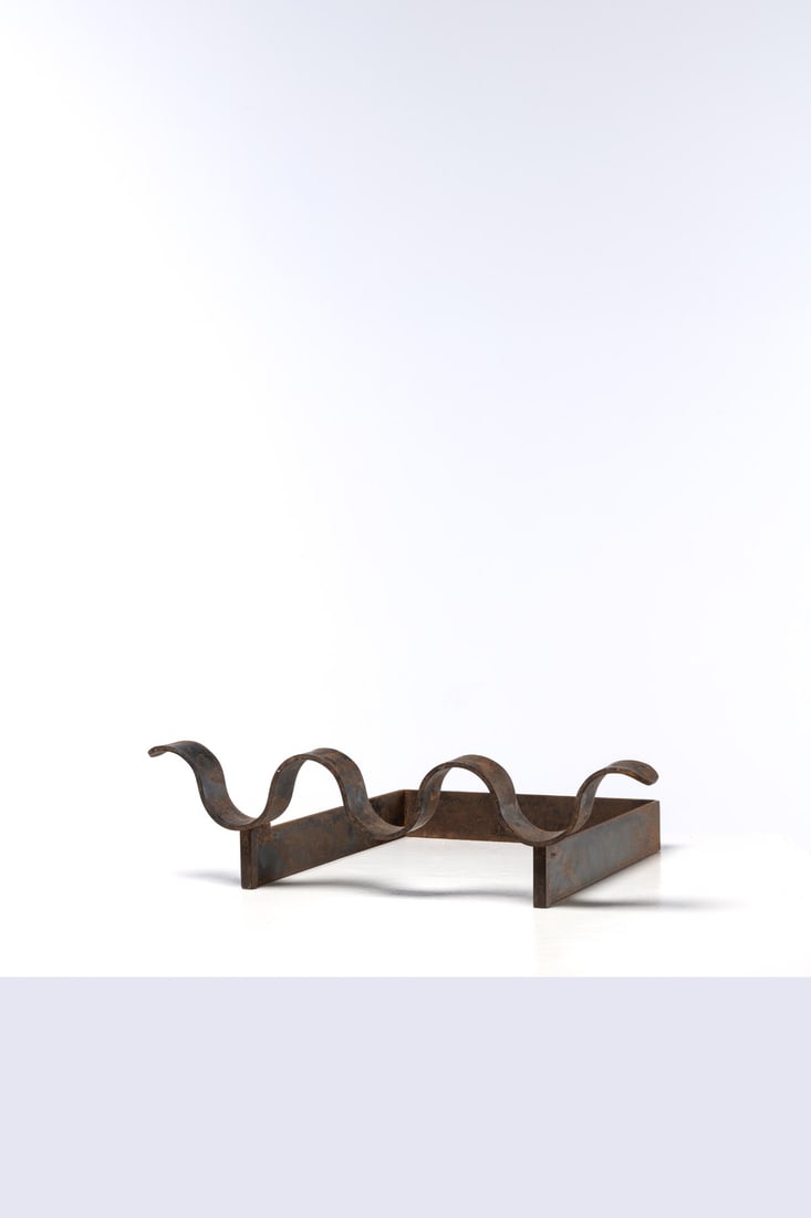 Jean Royère (1902-1981) Log holder: Jean Royère (1902-1981)Log holderCast ironModel created circa 1937H 15 × L 57 × W 45 cmBibliography:- 'Ensembles mobiliers', Volume 1, M. Duash wood, Ed. Charles Moreau, 1937, similar m