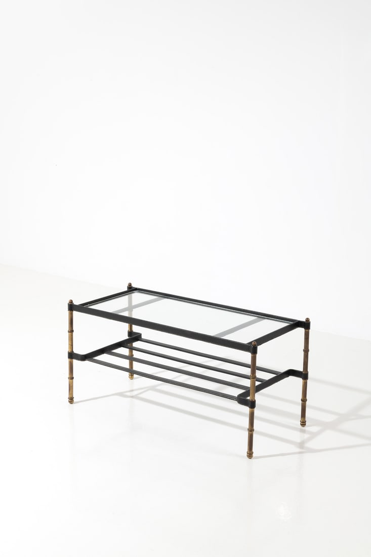 Jacques Adnet (1918-1992) Coffee table: Jacques Adnet (1918-1992)Coffee tableLeather, brass and glassModel created circa 1950H 46 × L 95 × W 42 cmBibliography: 'Jacques Adnet', A.R. Hardy & G. Millet, Les Éditions de