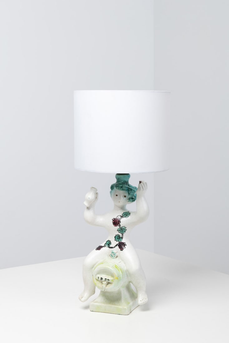 Georges Jouve (1910-1964) 'Bacchus' lamp: Georges Jouve (1910-1964)'Bacchus' lampGlazed ceramicDated '1950' on the barrelModel created in 1950H 42,5 × L 18 × W 16 cmWith lampshade: H 58,5 × Ø 25 cmBibliography:- 'Georges