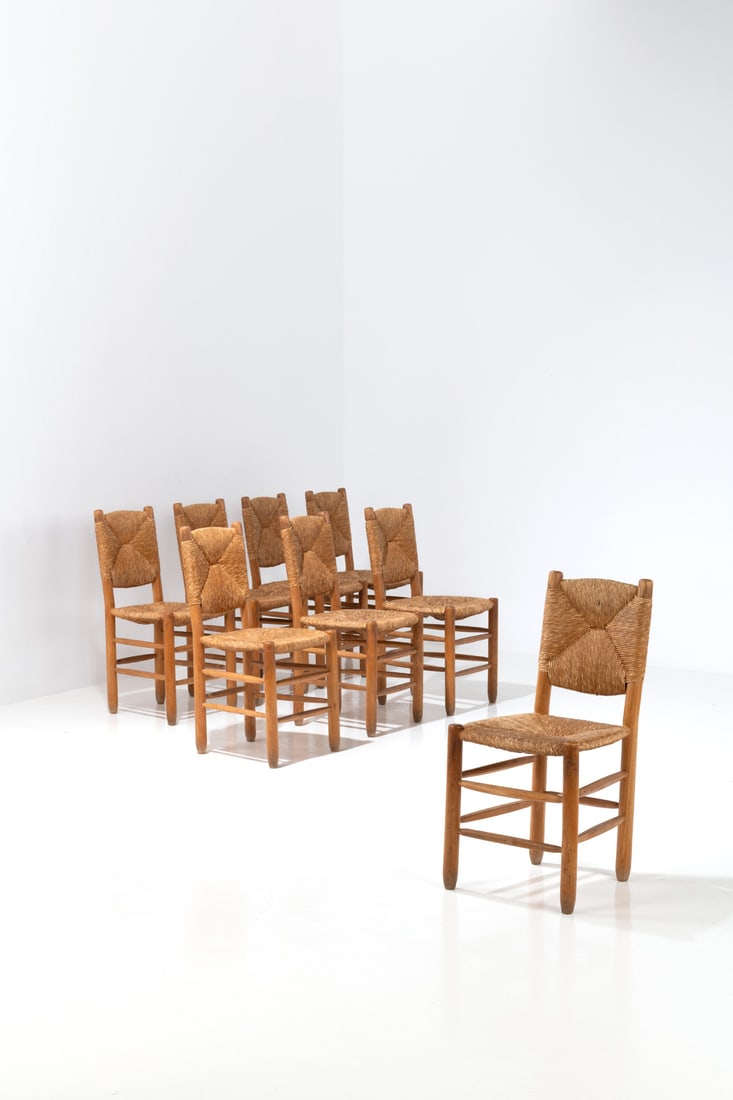 Charlotte Perriand (1903-1999) Set of eight chairs, model no. 19 , 'Bauche' (1 of 1)