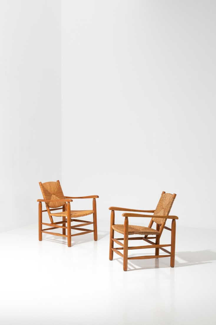 Charlotte Perriand (1903-1999) Pair of armchairs model no. 21 'Chamrousse' (1 of 2)