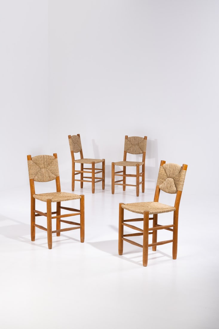 Charlotte Perriand (1903-1999) Set of four chairs, model no. 19, 'Bauche' (1 of 1)