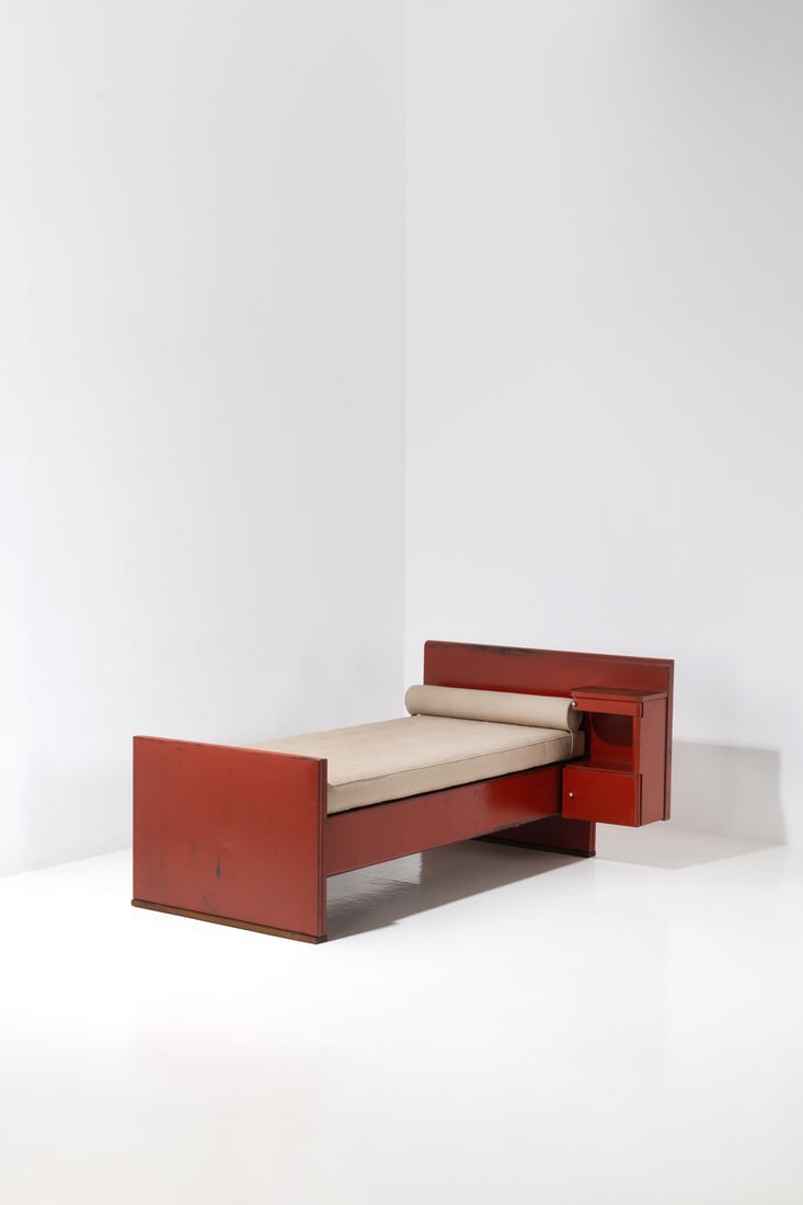 xx Jules Leleu (1883-2961) & Jean Prouvé (1901-1984) Bed: xx Jules Leleu (1883-2961) & Jean Prouvé (1901-1984)BedLacquered and folded metal sheet, fabric and oakManufactured by the Ateliers Jean ProuvéModel created in 1936H 94 × L 202 × W
