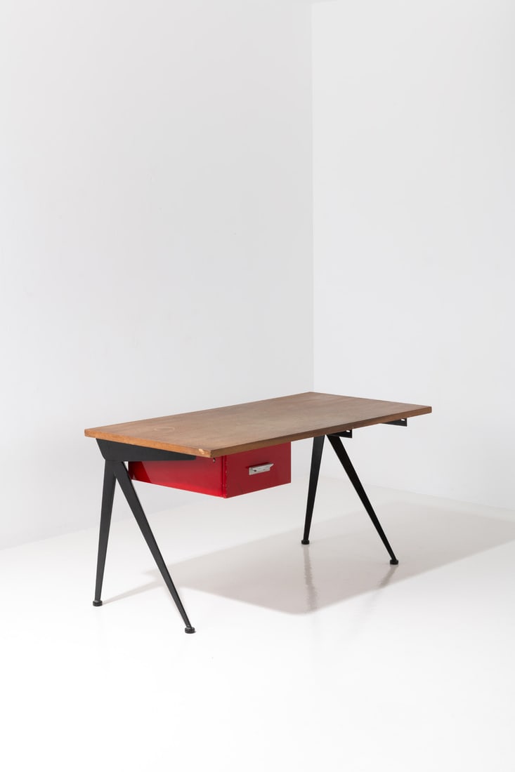 Jean Prouvé (1901-1984) 'Compas' desk: Jean Prouvé (1901-1984)'Compas' deskFolded steel sheet, aluminum and oakManufactured by the Ateliers Jean ProuvéModel created circa 1953H 74 × L 140,4 × W 70 cmBibliography:- 'Jean