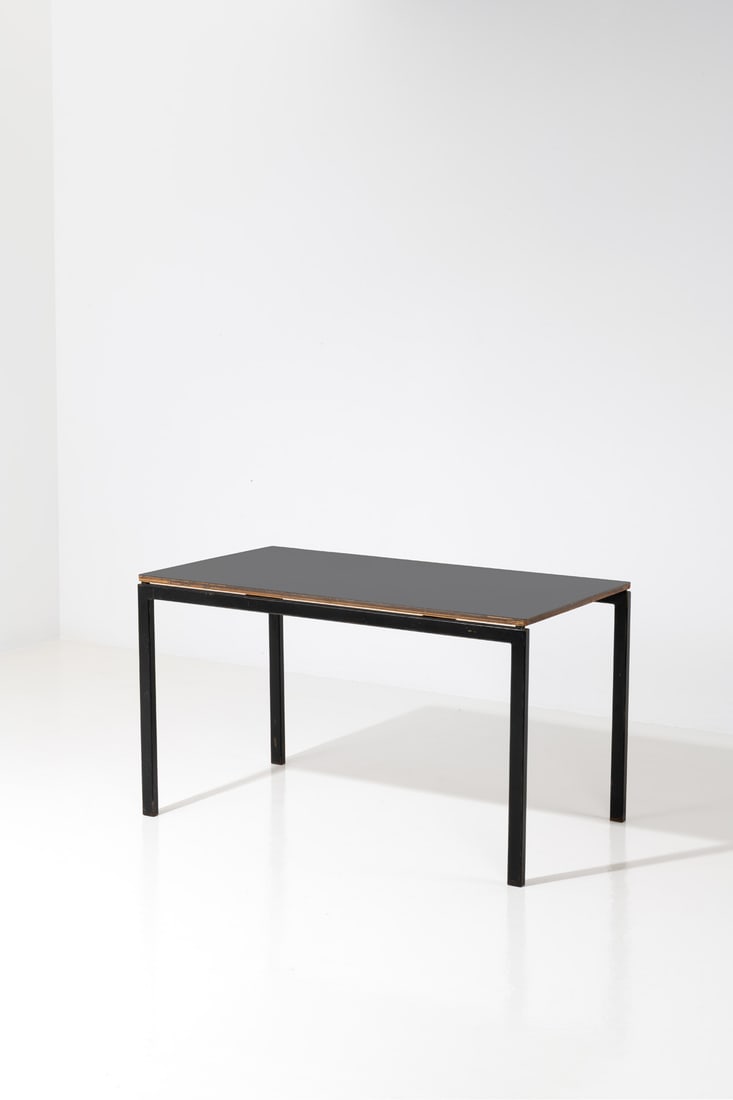 xx Charlotte Perriand (1903-1999) Table: xx Charlotte Perriand (1903-1999)TableLacquered metal and melamineModel created circa 1957H 70 × L 120 × W 69,5 cmProvenance: Model created for the Cité Mbaye Taïba, SenegalBibliog