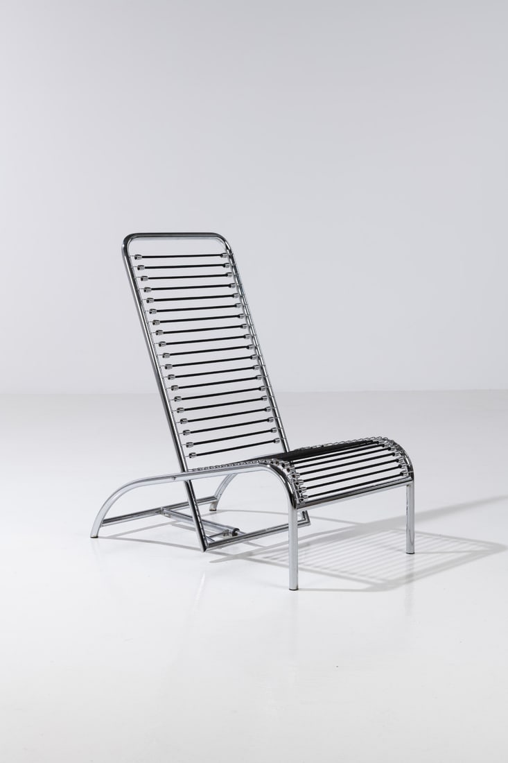 René Herbst (1891-1982) Chaise longue - ‘Sandow Chair’ model Chrome-plated steel: René Herbst (1891-1982)Chaise longue - ‘Sandow Chair’ modelChrome-plated steel and elastic strapsEcart International editionModel created in 1927Our 1990 modelH 97 x W 56 x D 88 cm