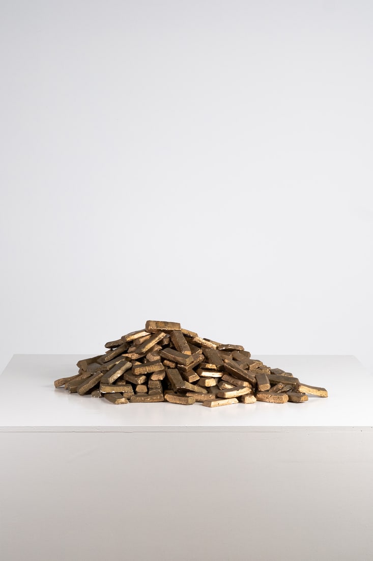 Vincent Olinet (born in 1981) Hand-forged gold, 2004 Installation of approximately 450 gold-plated: Vincent Olinet (born in 1981)Hand-forged gold, 2004Installation of approximately 450 gold-plated plaster ingotsVariable dimensions