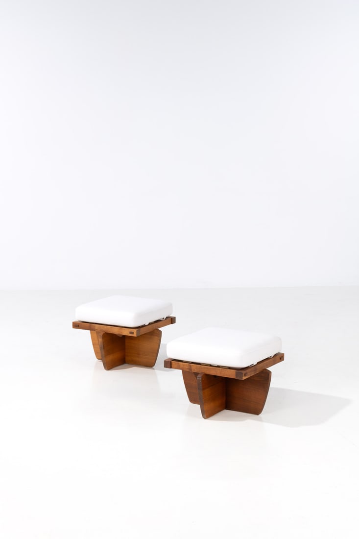x George Nakashima (1905-1990) Pair of hassocks - 'Greenrock' Model: x George Nakashima (1905-1990)Pair of hassocks - 'Greenrock' ModelWalnut and woolModel created circa 1975H 39 × L 55 × W 55 cmProvenance:- Laffanour / Galerie Downtown, Paris- Purchased dire