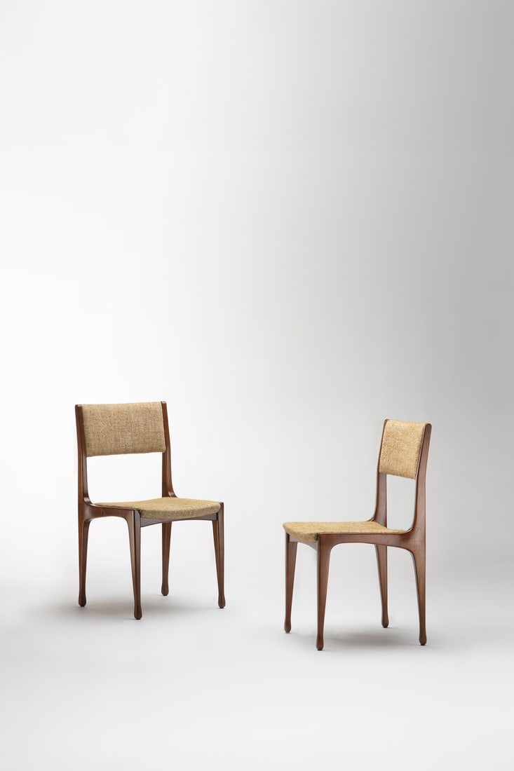 Carlo de Carli (1910–1999) Pair of chairs - '693' Model Walnut and fabric Cassina edition: Carlo de Carli (1910–1999)Pair of chairs - '693' ModelWalnut and fabricCassina editionModel created in 1957H 85.5 × W 45.5 × D 50 cm