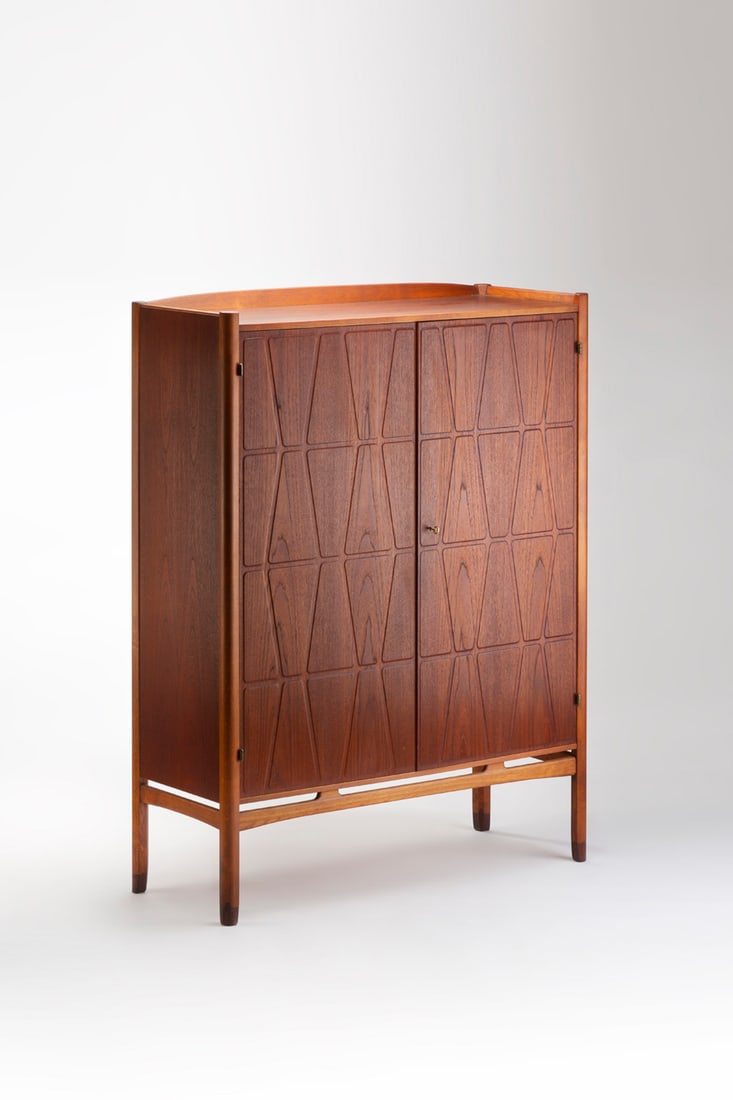 Yngve Ekström (1913–1988) Cabinet - 'Bangkok' Model Teak, beech and brass Westbergs: Yngve Ekström (1913–1988)Cabinet - 'Bangkok' ModelTeak, beech and brassWestbergs Möbler editionModel created in 1952H 161 × W 120 × D 48 cm