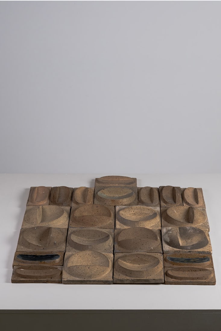 Pierre Digan (1941–2016) Set of ornamental plaques Partially glazed stoneware La Borne edition: Pierre Digan (1941–2016)Set of ornamental plaquesPartially glazed stonewareLa Borne editionModel created in 1970Square: H 21.5 × W 22.5 × D 6 cmRectangle: H 11 × W 21.5 × D 5