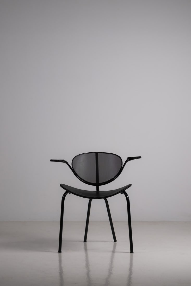 Mathieu Matégot (1910–2001) Armchair - 'Nagazaki' Model Perforated sheet metal and: Mathieu Matégot (1910–2001)Armchair - 'Nagazaki' ModelPerforated sheet metal and lacquered metalModel created in 1954H 76.5 × W 69.5 × D 60 cmBibliography:- Patrick Favardin, Les