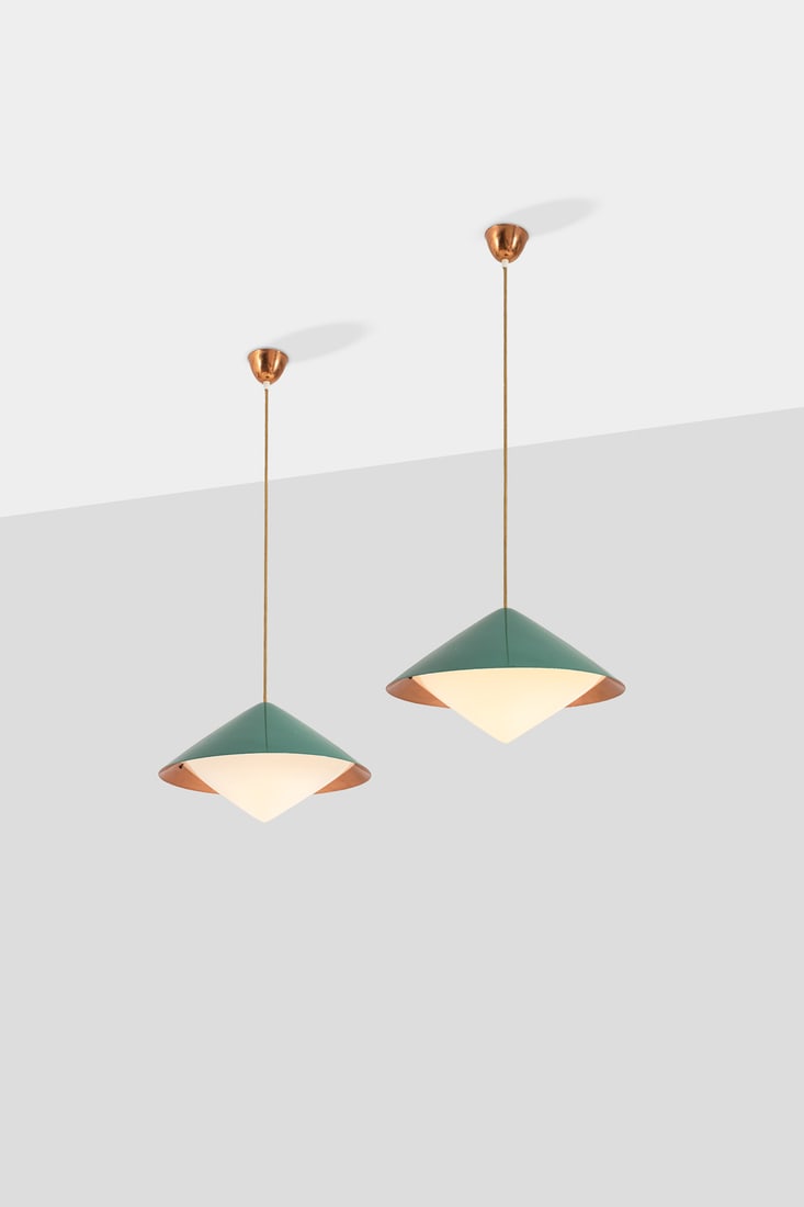 xx Svea Winkler (1924-2003) Pair of ceiling lamps - Model n°61-343: xx Svea Winkler (1924-2003)Pair of ceiling lamps - Model n°61-343Lacquered metal and acrylicEdited by OrnoEach stamped with 'Orno'Model created circa 1955H 140 × Ø 45 cmBibliography:- S