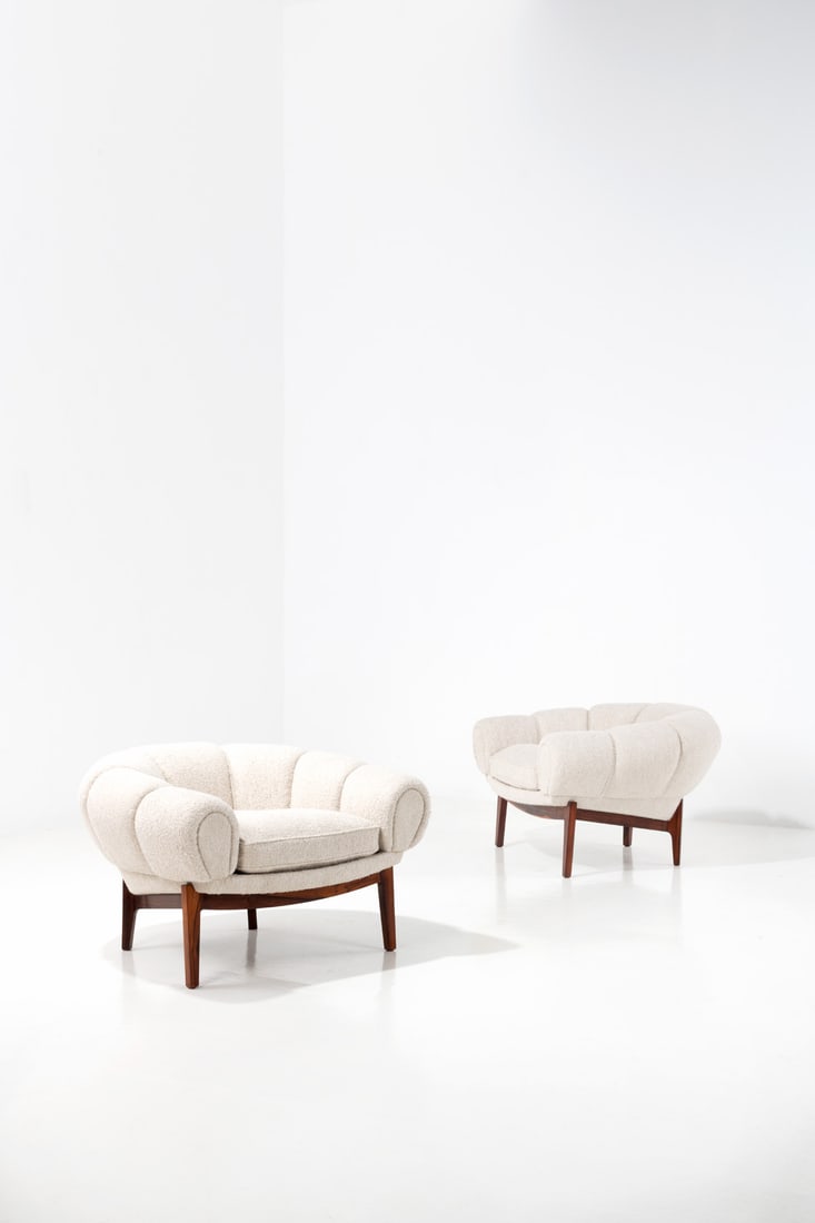 Illum Wikkelsø (1919-1999) Pair of 'Croissant' armchairs: Illum Wikkelsø (1919-1999) Pair of 'Croissant' armchairs Rosewood and fabric Edited by Århus Polster Møbelfabrik Model created in 1962 H 59 × L 93 × W 82 cm