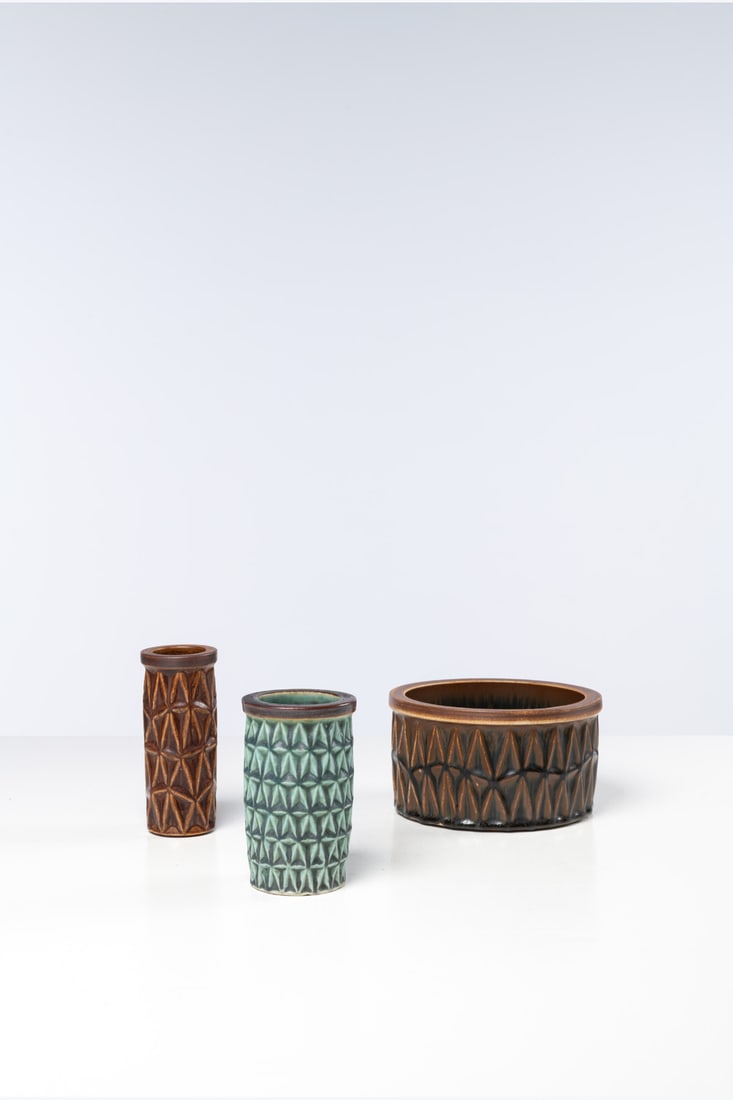 Eva Stæhr-Nielsen (1911-1976) Set of three vases: Eva Stæhr-Nielsen (1911-1976) Set of three vases Glazed ceramic Edited by Saxbo Inscribed with 'Saxbo', located 'Denmark' and annotated '904', '910' and '912' Models created circa 1950 H 18 ×