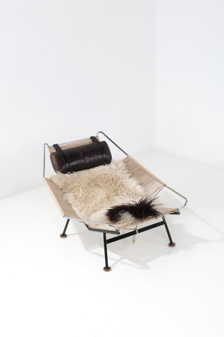 Hans J. Wegner (1914-2007) Armchair, model GE 225 'Flag Halyard': Hans J. Wegner (1914-2007) Armchair, model GE 225 'Flag Halyard' Chromed and lacquered metal, rope and fabric Edited by Getama Model created in 1950 H 81 × L 105 × W 115 cm Bibliography: - '