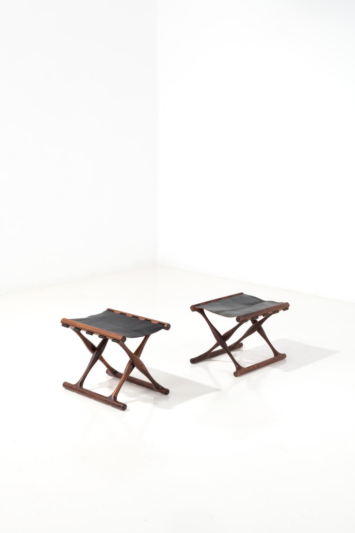 Poul Hundevad (1917-2011) Pair of stools, model PH 43 'Guldhoj': Poul Hundevad (1917-2011) Pair of stools, model PH 43 'Guldhoj' Teak and leather Edited by Domus Danica Manufacturer's labels H 40 ×L 48 × W 38 cm