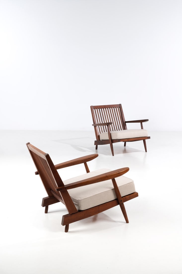 x George Nakashima (1905-1990) Pair of low armchairs - 'Cushion chairs with arms' (1 of 3)
