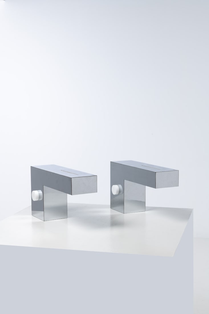 x George Kovacs (1926-2007) Pair of table lamps: x George Kovacs (1926-2007) Pair of table lamps Chromed steel and plastic Model created in the 1970s H 25 x L 46 x W 15 cm