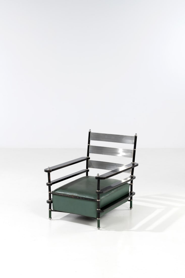 x Warren McArthur (1885-1961) Armchair: x Warren McArthur (1885-1961) Armchair Steel, aluminum, lacquered metal, painted walnut and leatherette Edited by The Pullman Company Model created in the 1920s H 76 x L 63 x W 72 cm