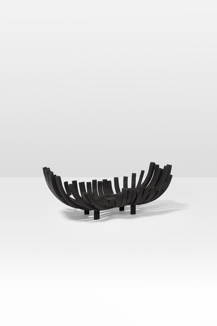 Ado Chale (1928-2025) Fire basket: Ado Chale (1928-2025) Fire basket Blackened steel Model created circa 1970 H 25 × L 66 × W 34 cm The buyer can be provided with an authenticity certificate